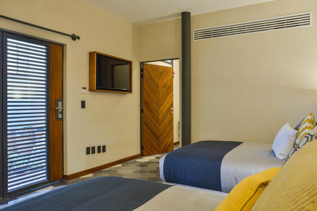 Hotel Criol Querétaro Extérieur photo A room at the hotel