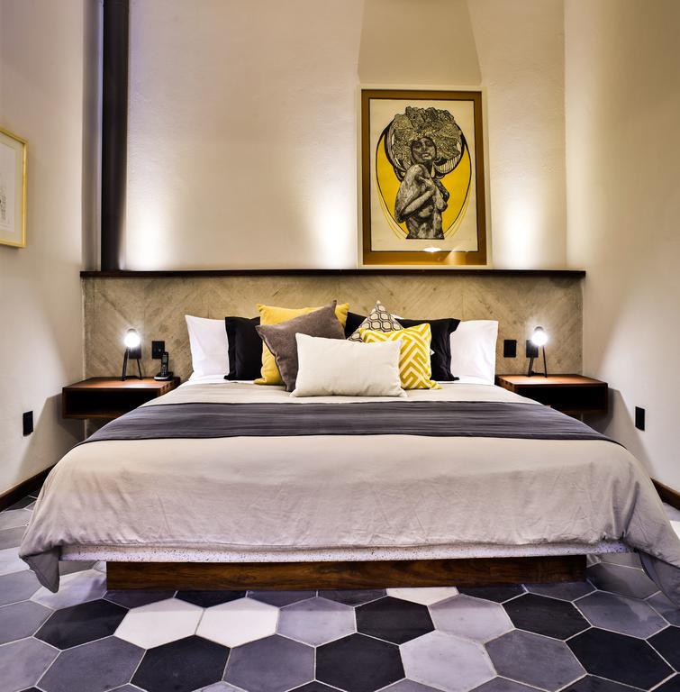 Hotel Criol Querétaro Extérieur photo A bedroom at the hotel